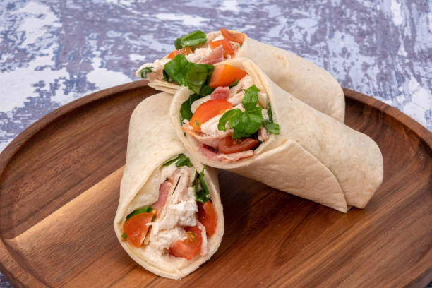 istock Deli chicken and bacon wrap sandwich 1264718560