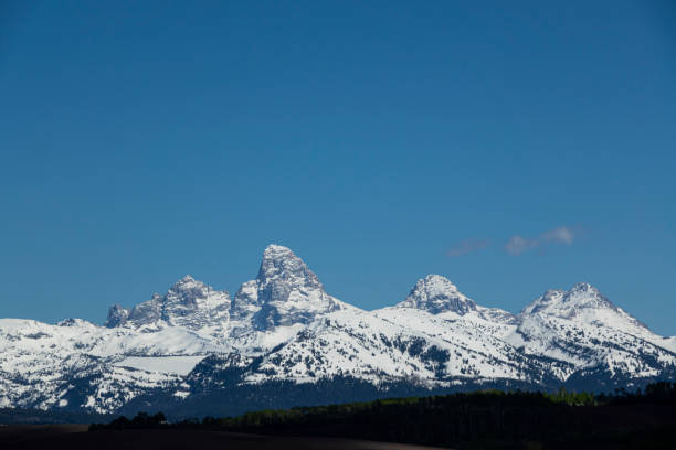 The Grand Teton Range is famous for its breathtaking beauty, most often seen from the Wyoming side, However, these massive peaks are as impressive from the west looking east. The mountains are covered by fresh snow thanks to a major spring storm.