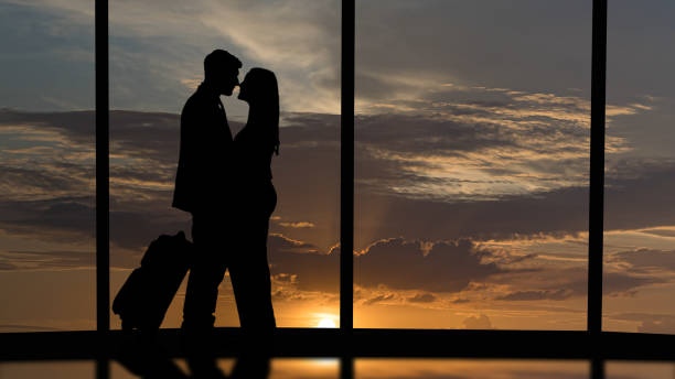 istock The romantic couple standing in the big hall with a scenery sky view 1264719408