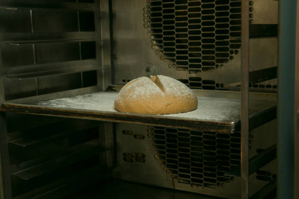 istock The process of making bread. The chef sends the bread to be baked. 1264719479