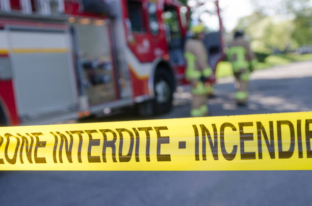 istock Firetruck and firemen with emergency banner 1264721156