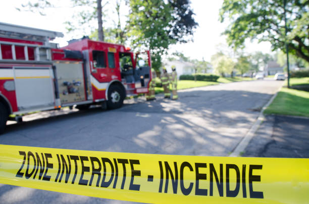 istock Firetruck and firemen with emergency banner 1264721167