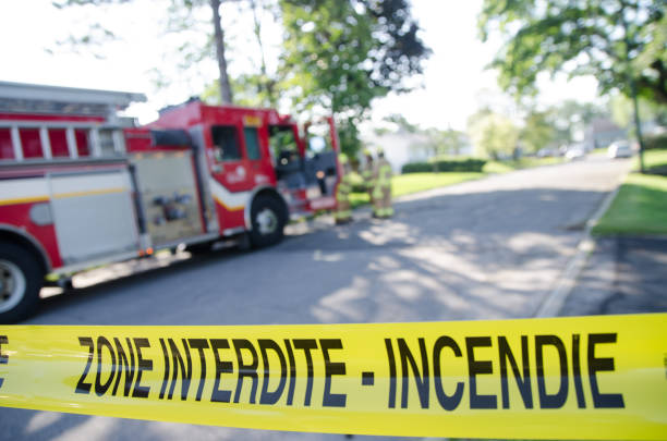 istock Firetruck and firemen with emergency banner 1264721195