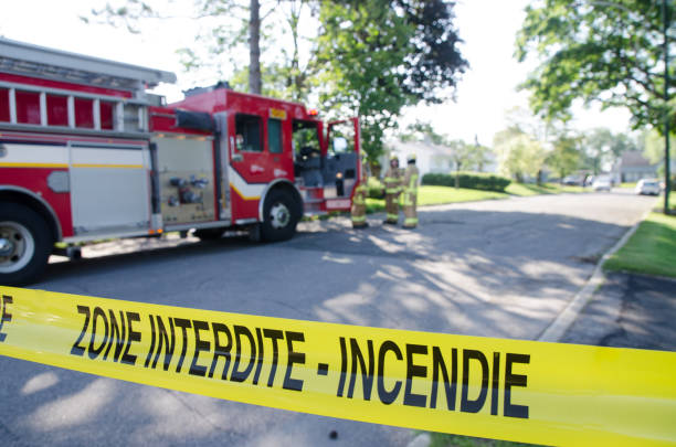 istock Firetruck and firemen with emergency banner 1264721229