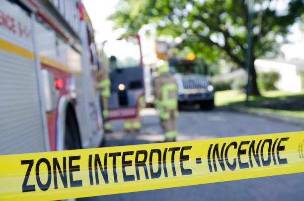 istock Firetruck and firemen with emergency banner 1264721292