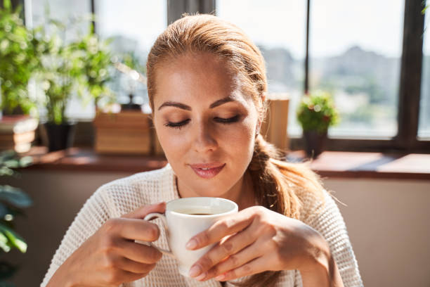 istock Peaceful lady enjoying her morning coffee alone 1264721316