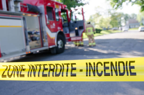 istock Firetruck and firemen with emergency banner 1264721403