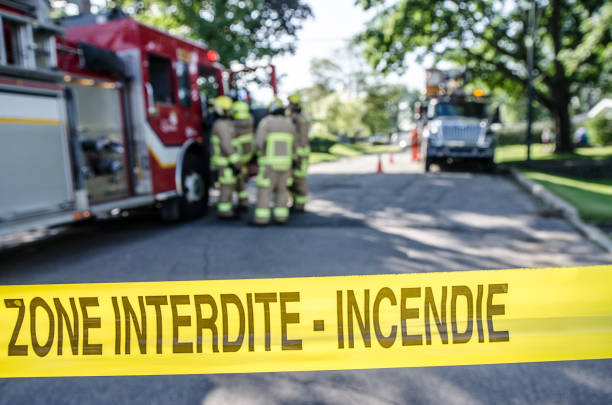 istock Firetruck and firemen with emergency banner 1264721469