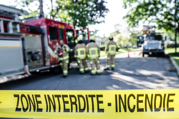 istock Firetruck and firemen with emergency banner 1264721496