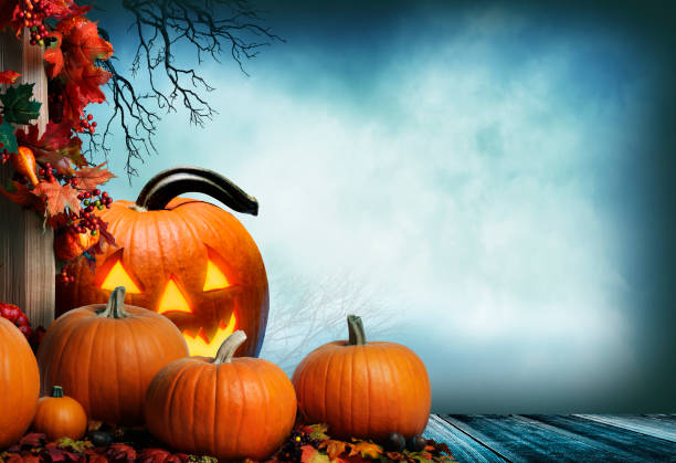 Jack O'Lantern On Porch Adorned With Autumn Leaves