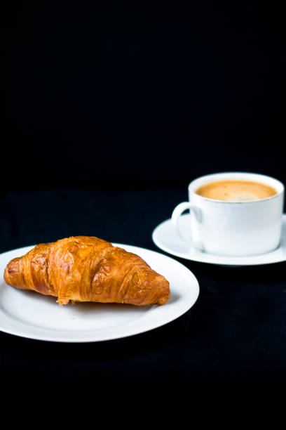 istock A fresh croissant with morning coffee 1264727606