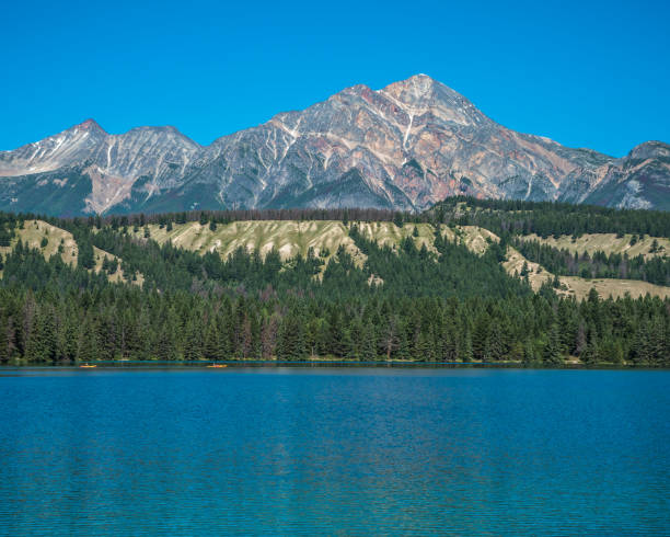 istock Morning Mountaintop with Crystal Blue Lake 1264731959