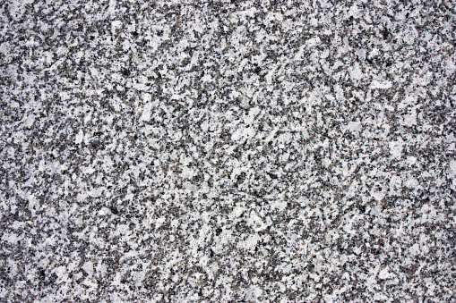 Gray polished granite texture as a background