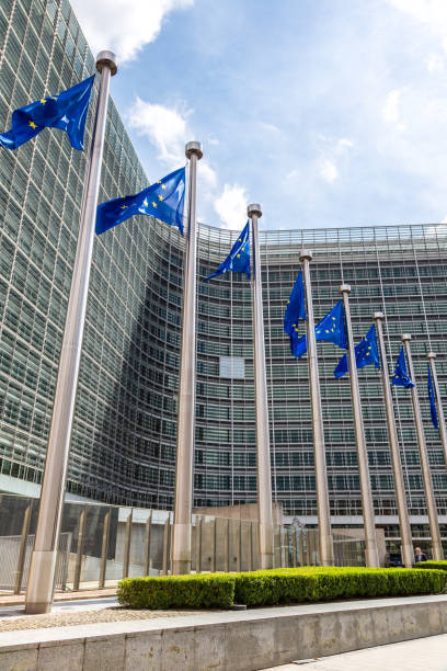 European flags  in Brussels European flags in front of  headquarters of European commission in Brussels in summer day law european community european union flag global communications stock pictures, royalty-free photos & images