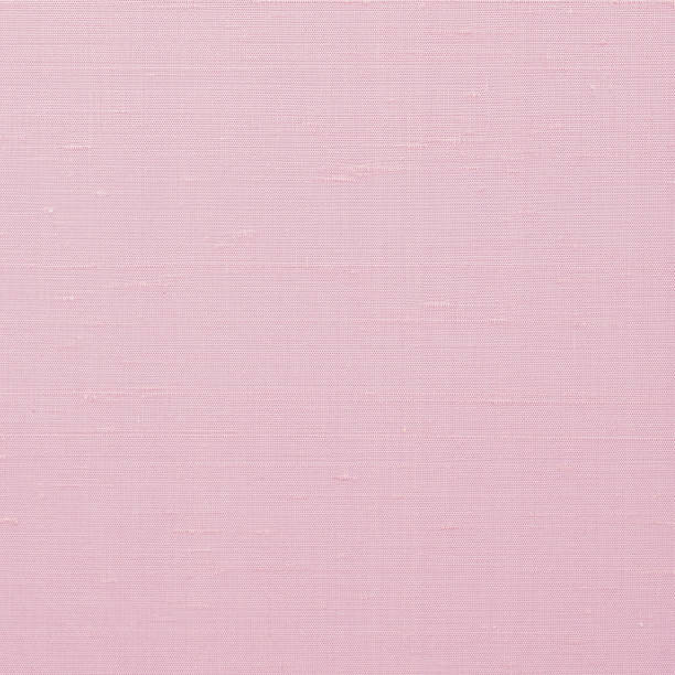 istock Woven cotton linen fabric textile textured backdrop in pastel light sweet romantic pink red color tone 1264736407