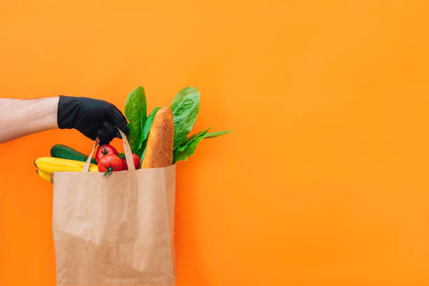 istock Paper bag of different food. 1264736637