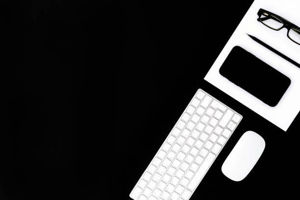 istock Office supplies on black background. 1264736640