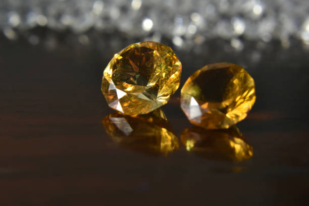 istock Yellow gem Beautiful on the wooden floor 1264739763