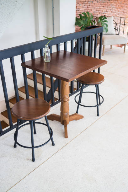 istock Wooden stool seat and table 1264750744