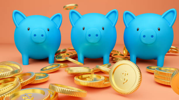 istock Piggy banks and coins. 1264753810