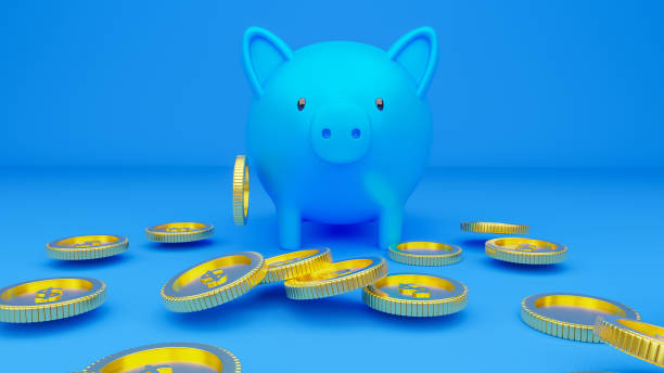 istock A piggy bank and falling coins. 1264753822