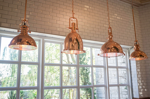 Elegant copper hanging light lamp, stock photo