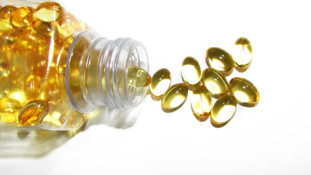istock Cod liver oil  or fish oil gel capsules  on white background. 1264770423