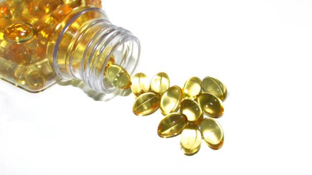 istock Cod liver oil  or fish oil gel capsules  on white background. 1264770426
