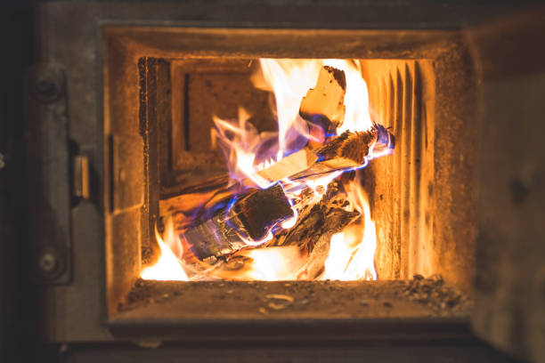 istock Blaze fire flame in stove, orange and black 1264782977