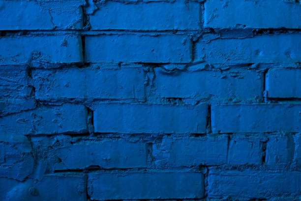 istock texture: old cracked brick wall painted in blue paint 1264792619