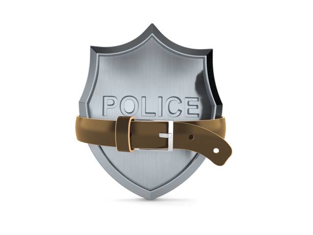 istock Police badge squeezed by belt 1264797195