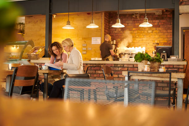 istock business advisor with new business owner 1264797717