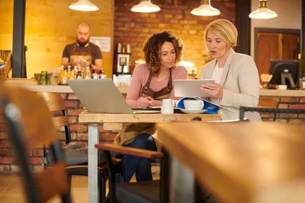 istock business advisor with new business owner 1264797793