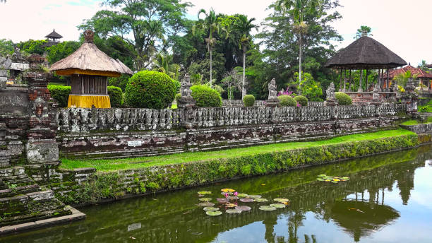 istock River view with lotus and Balinese architecture that looks cool and beautiful 1264798839