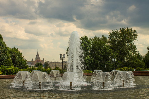 Panoramic view of Moscow Russia and a beautiful fountain in Victory Park on a cloudy summer day and copy spacy
