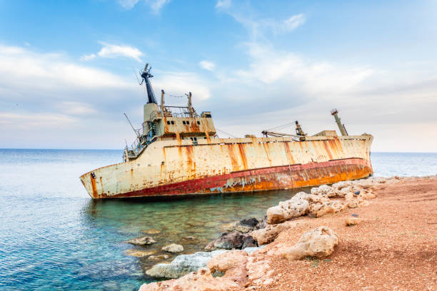 istock Abandoned rusty ship stranded ashore nearby Peyia village, Paphos, Cyprus 1264803284