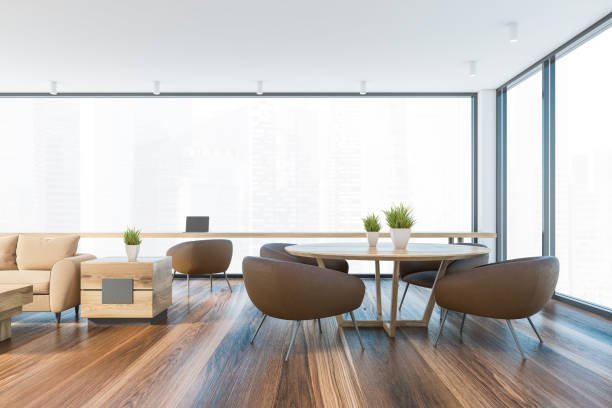 istock Living room and dining room with brown armchairs 1264806492