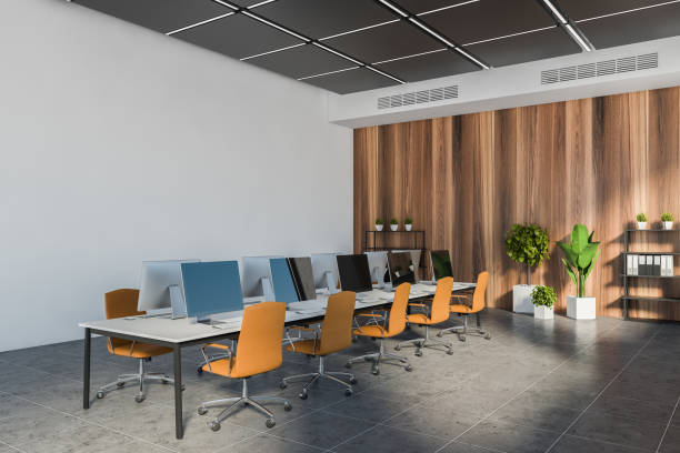 istock White and wooden open space office corner 1264808026