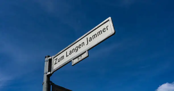 Photo of Zum Langen Jammer - to the long misery - street sign in Berlin, Germany