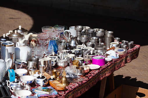 Cups and more on table on flea market in Bremen