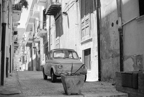 Classic Fiat 500 parked in Sicilian street
