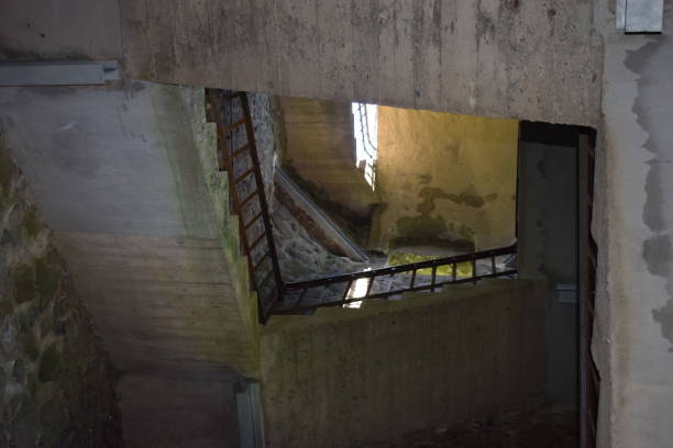 istock stairway up an old tower 1264817639