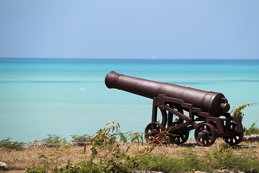 Historic Cannon at Fort James Beach Antigua overlooking the sea
