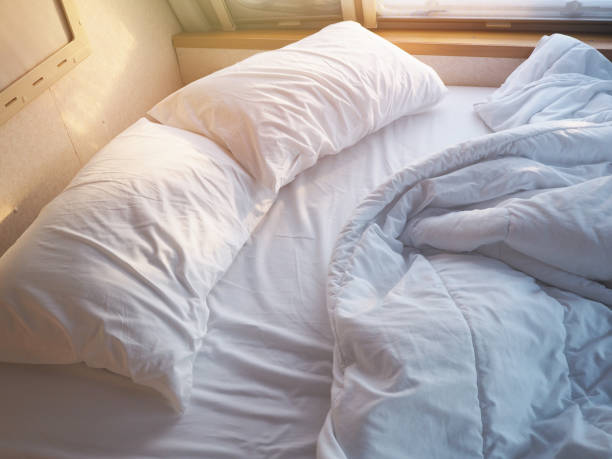 istock Unmade bedroom in the morning. 1264824361