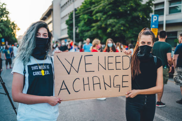 istock Protestant women holding a poster 1264826768