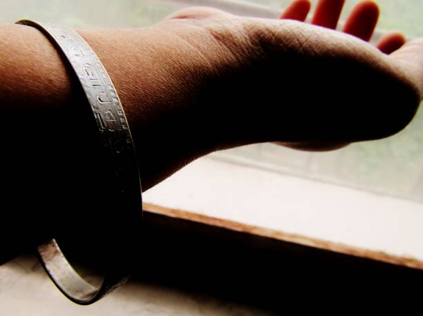 Various silver rings on a senior woman's hand in Japan