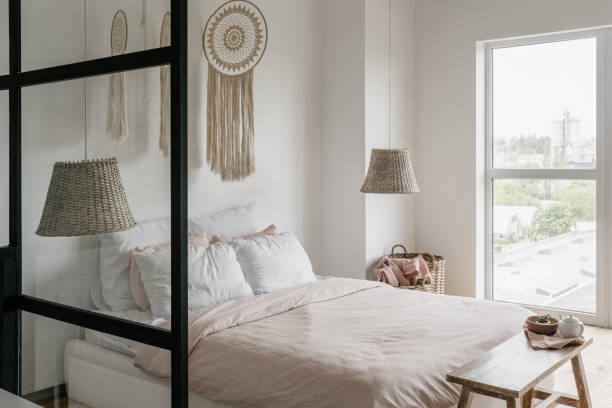 istock Modern house with bright bedroom, decor and comfortable bed 1264831100