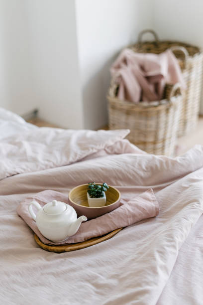 istock Bright and comfortable bedroom with soft bed 1264831104