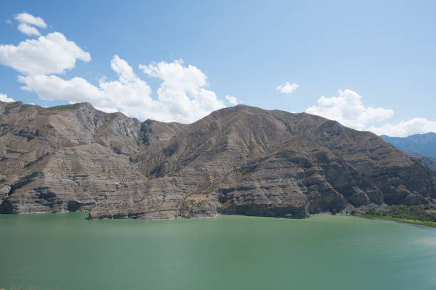 At the same time, four small lakes were formed on the rubble from the landslide by water seeping from underground through the material from the rock fall. The water of these lakes is remarkably clear and blue.These four small lakes, Incegol, Karagol, Efendigilin Golu and Nazligilin Golu, contain large quantities of trout. The Tortum Lake is surrounded by limestone marls of the Cretaceous period. Earth pillars can be seen on the eastern shores of the lake. The view of the lake from the steep slopes along the edge is particularly beautiful. As this is a landslide lake its depth begins from zero and reaches 100 m in the deepest part. The lake lies about 100 m above sea level.