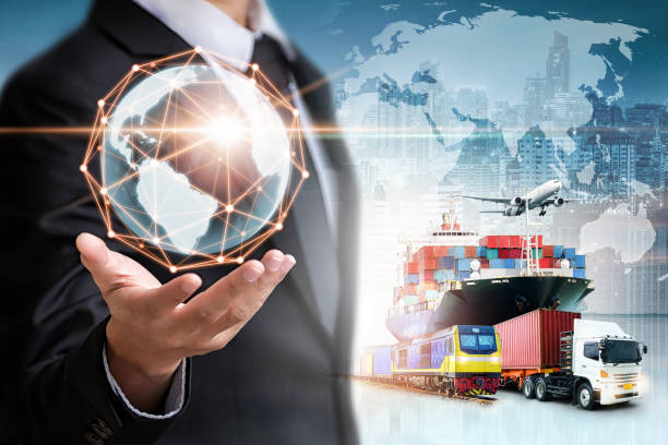 istock Businessman holding digital globe in palm for logistics import export background and container cargo freight ship transport concept 1264834125